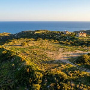 Aerial view of a buildable plot of land for sale in Cyprus with Mediterranean sea view