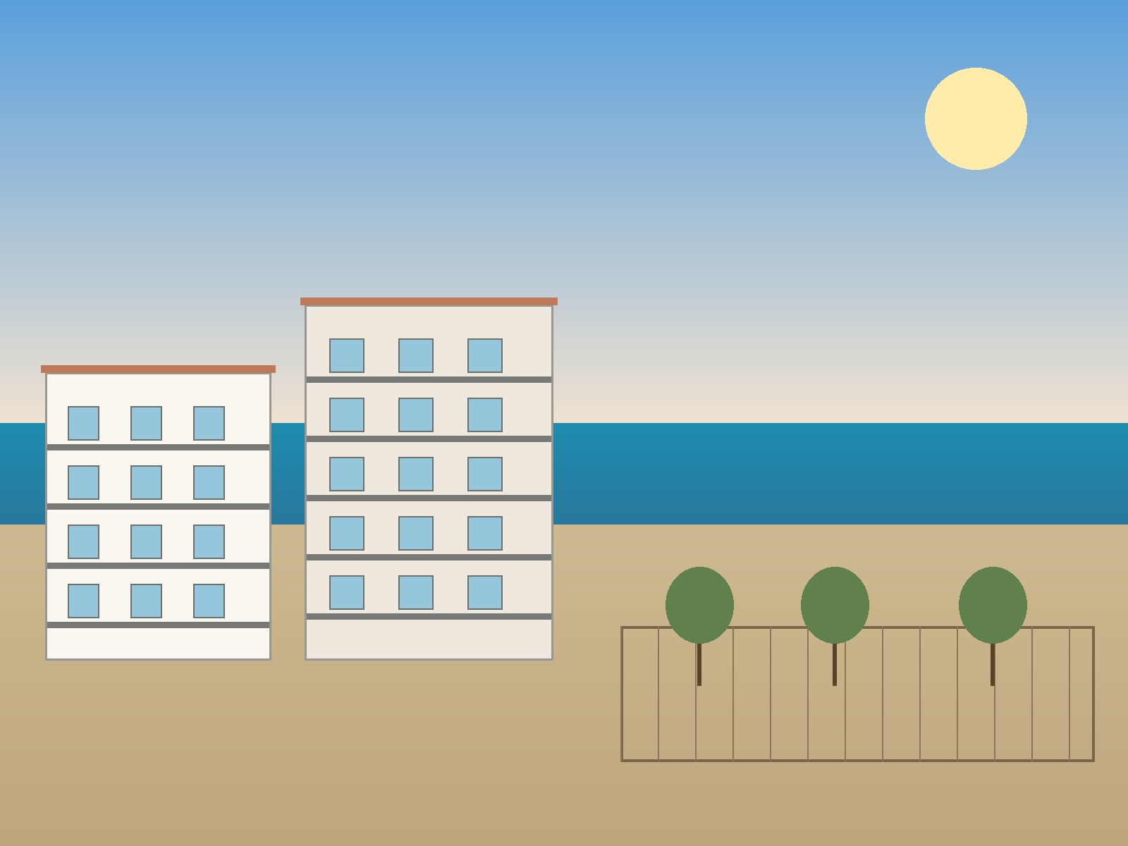 Low-rise apartment buildings and an open plot of land near the sea in Mazotos, Larnaca District, Cyprus